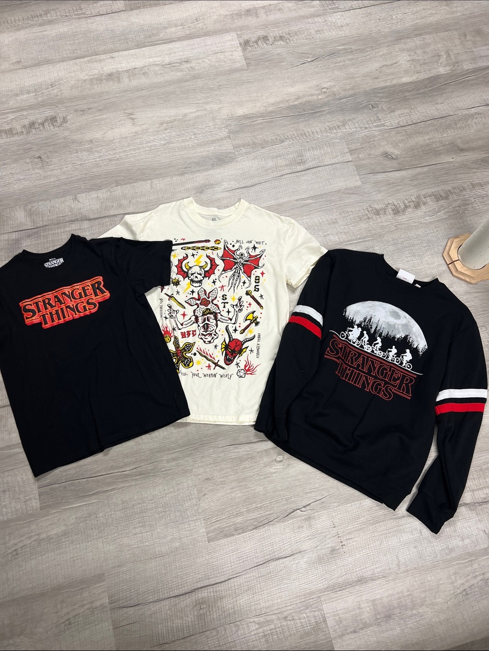 Stranger Things Graphic Tees and sweatshirt. See tags for sizes